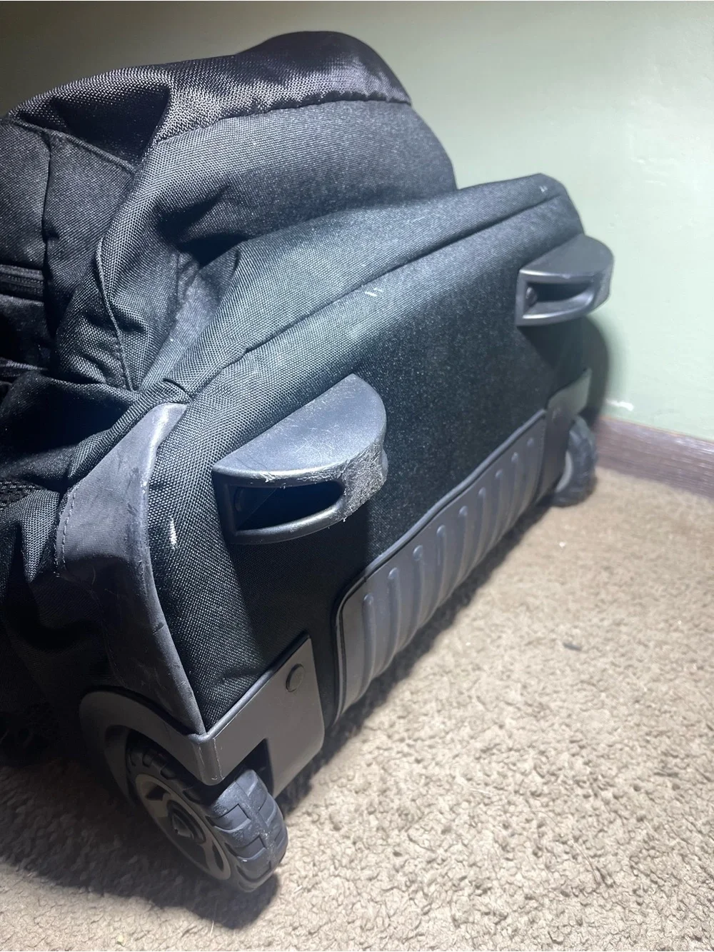 Jansport Black Rolling Backpack with Telescopic Handle